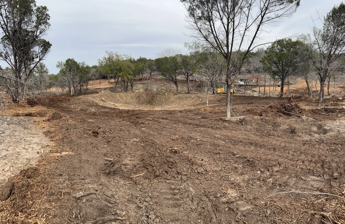 Wooded Central Texas lot cleared with select trees kept