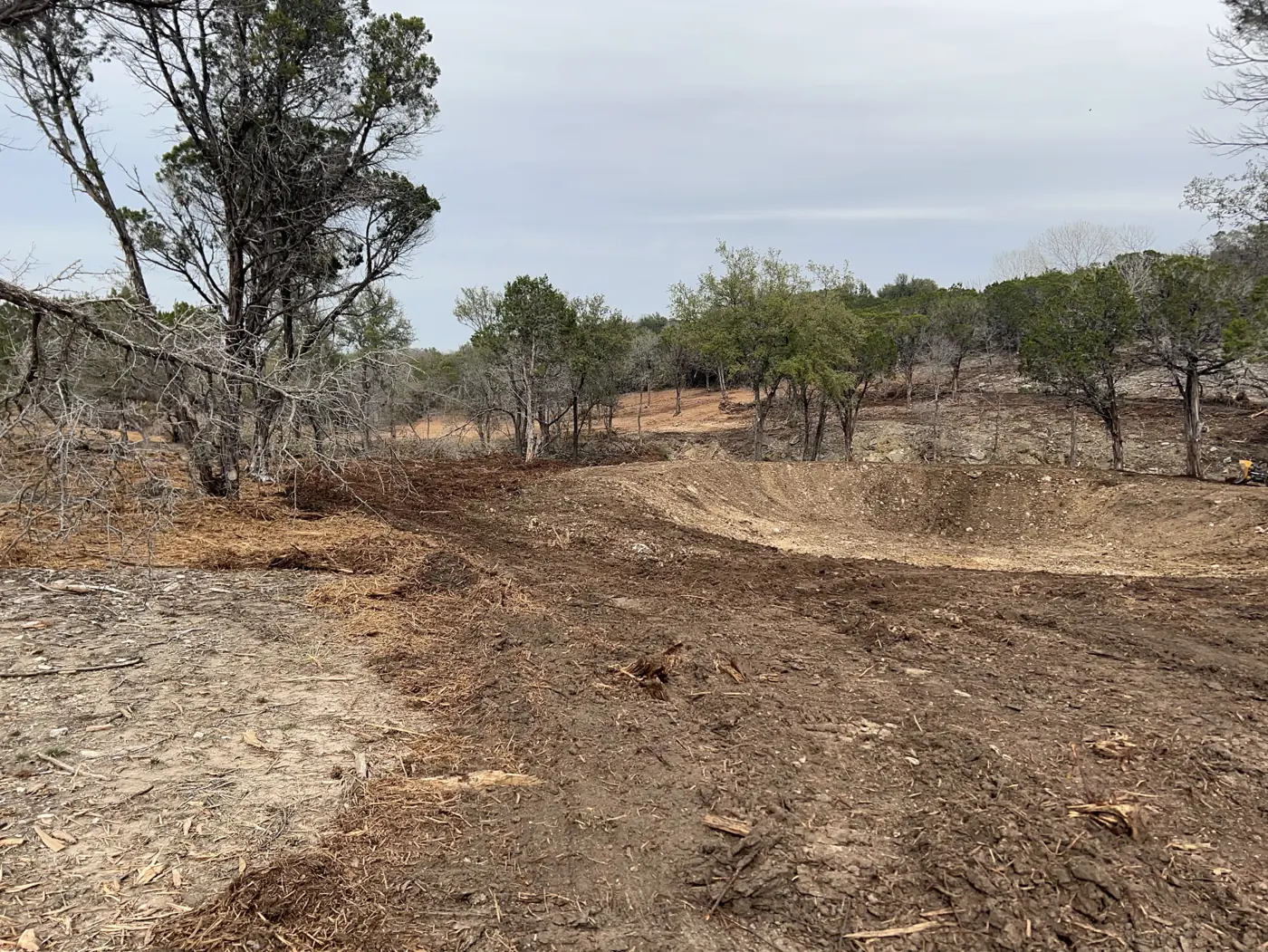 Brush and trees cleared from a wooded lot in winter, Central Texas