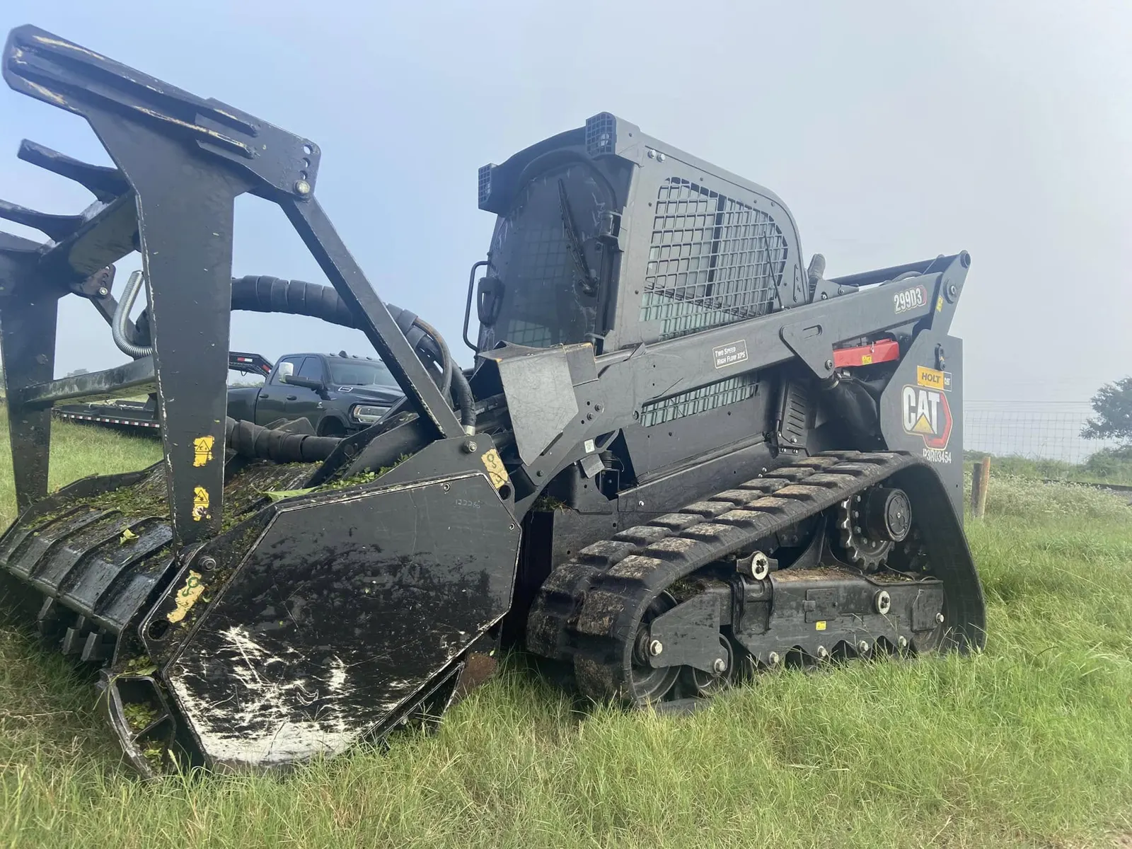 Tracked mulcher clearing brush on a South Texas property