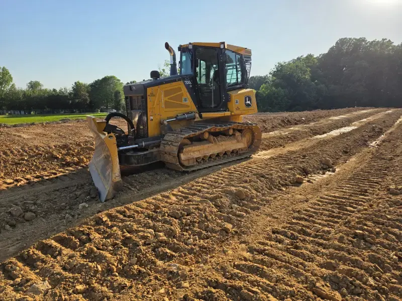 John Deere dozer grading a cleared lot in Tennessee